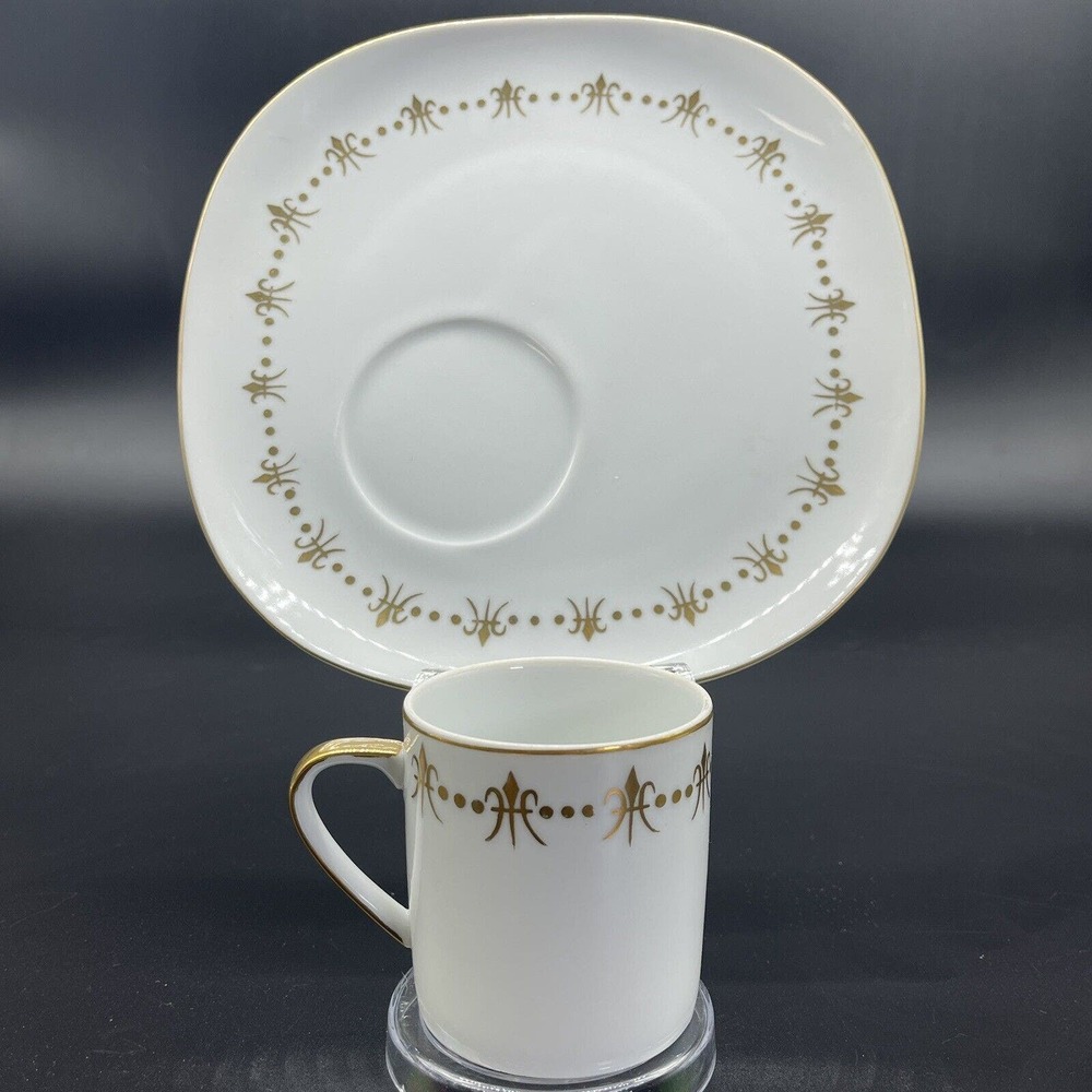 Elegant White and Gold Cup and Saucer Set